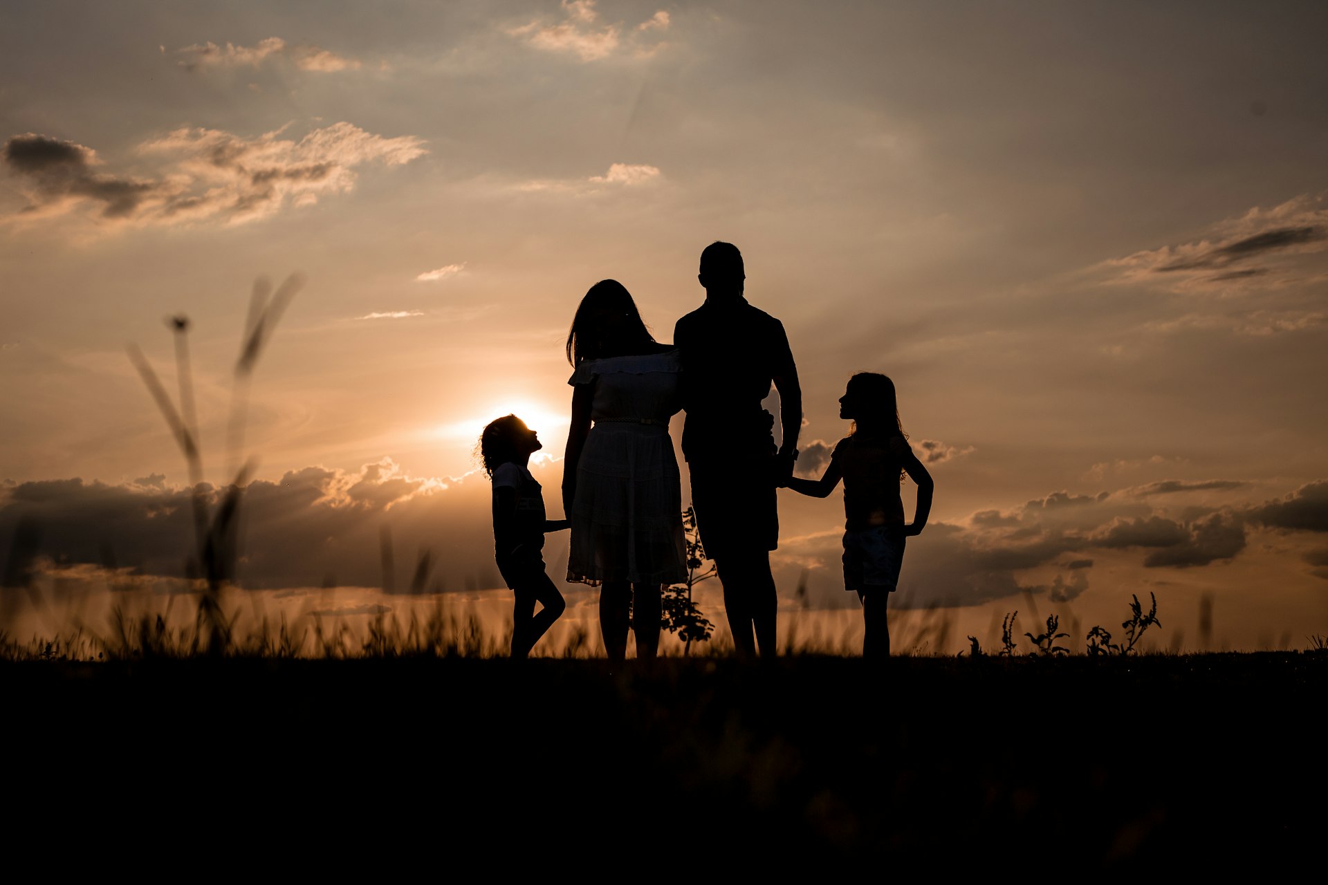 Family at sunset — relationships and the journey